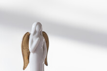 Marble Angel Figurine With Golden Wings. Christmas Ornament.