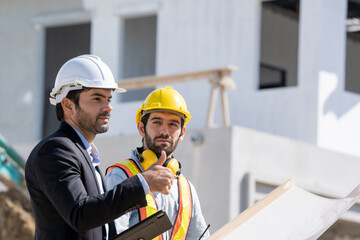 Poster - The businessman or boss gives the consultant to engineer,They are consulting and solving the problems in construction site planning for new house.