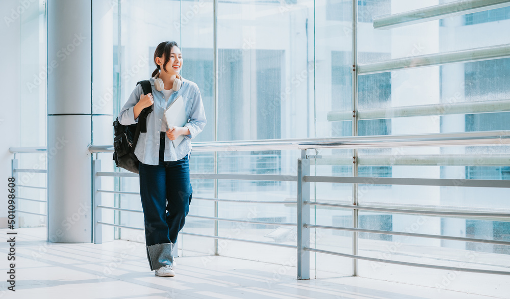 Image of young Asian college girl at school Stock Photo | Adobe Stock