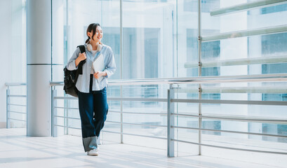 Image of young Asian college girl at school