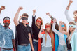 © ASDF - close up. a variety of young people in capes superhero standing together