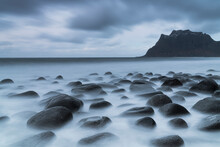 Dark Clouds Over Uttakleiv Beach And Stones Washed By Sea, Leknes, Vestvagoy, Nordland, Lofoten Islands