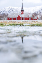Church Of Flakstad Reflected In A Pond In Winter, Nordland County, Lofoten Islands