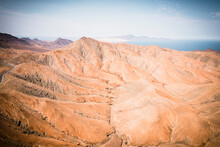 High Angle View Of Barren Mountains In The Mist From Sicasumbre Astronomical Viewpoint, Fuerteventura, Canary Islands