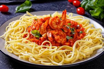 Sticker - shrimps in tomato sauce with pasta, top view