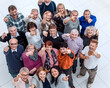 © ASDF - group of happy elderly people pointing at you .