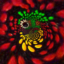Design Spiraling Around The Center In Glowing Red Yellow And Green Dots On A Black Background
