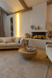 © 4595886 - cozy warm home interior of a chic country house with an open plan, wood finishes, warm colors and a family hearth. view of the recreation area for family and guests