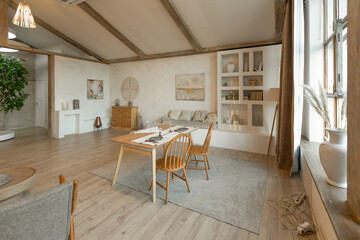 Wall Mural - cozy warm home interior of a chic country chalet with a huge panoramic window overlooking the winter forest. open plan, wood decoration, warm colors and a family hearth