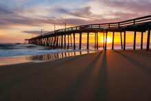 Sunrise Behind Fishing Pier Along North Carolina's Outer Banks