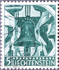 Wall Mural - LICHTENSTEIN - CIRCA 1959: a postage stamp from LICHTENSTEIN , showing a peal of the Belfry, Bendem Church . Circa 1959