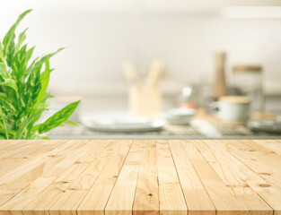 Wall Mural - Selective focus.Wood table top on blur kitchen counter background.