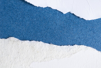 blue and white sheet of paper with a visible texture