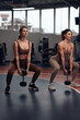 © astrosystem - Pretty women working out in a gym. Adult ladies with beautiful shaped bodies.