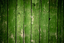 Old Wooden Green Background Of Boards With Cracked And Peeling Paint. Wooden Texture. Fence
