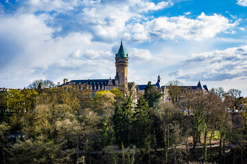 Looking Out across the Municipal Park at the Spuerkeess Bank Clock Tower in Luxembourg City, Luxembourg