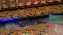 Pennies Drop Onto A Shelf Coin Penny Pusher Solt Machine In An Arcade Casino