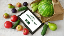 Organic Vegetables And Fruits In Cotton Bag And Tablet Pc, Online Market, Green Grocery Delivery At Home