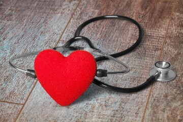 Canvas Print - Red heart with medical stethoscope, heart health concept, insurance concept, World heart day.