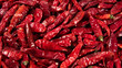 dry red chili peppers texture background