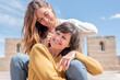 © Renata Hamuda - a lesbian couple hugging each other and enjoying each other's company outdoors, sexual freedom concept Lgbt, bisexuality, relationship lifestyle concept