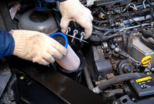 Replacing A New Fuel Filter On A Modern Car To Clean The Fuel From Dirt. Close-up