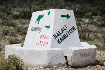 Wall Mural - Road marker for vehicles in Etosha National Park, Namibia