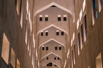 doha, qatar, april 22,2022: night views of the traditional arabic architecture of souq waqif market.