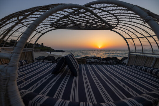 Sunset at Zaya Nurai luxury island resort in the Arabian Gulf near Abu Dhabi, United Arab Emirates