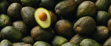 Lots Of Avocados With Halved Avocado With Seeds In A Pile, Vegan Food