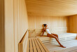 © BGStock72 - Young woman relaxing in the sauna
