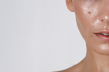 close-up girl with sweaty skin on her face and excessive oily sheen, excessive sweating, hyperhidros