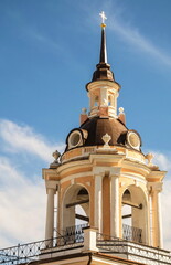 Elegant tower of an ancient church bell tower