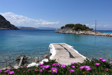 Paradise bay and small port with turquoise beach of Aponisos in island of Agistri, Saronic Gulf, Greece