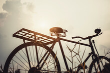 Back View Of Old Bicycle With Lighting Effect In Vintage Style