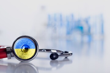 Canvas Print - Medical stethoscope in Ukraine flag color.