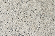 Old and dirty terrazzo floor that has been used.