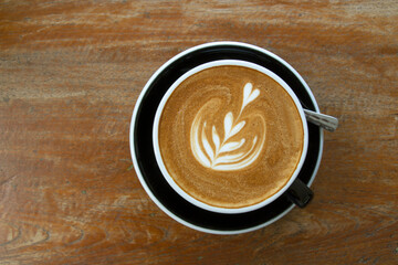 Wall Mural - hot coffee placed on wooden table background