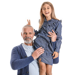 Wall Mural - Senior man with his little granddaughter on white background