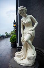 Very beautiful elegant beautiful female statue in roman style 