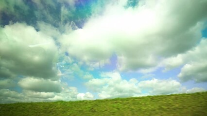 Wall Mural - blue sky background with white clouds in sunlight