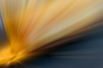 Wall Mural - starburst with sparkles in yellow and blue with motion blur