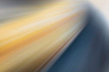 Wall Mural - light rays in motion blur in yellow and blue