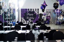 Venue Decorated With Black And Purple Decors For A 21st Birthday Party