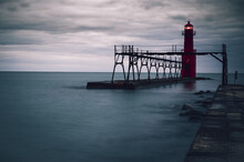 Beautiful Shot Of Algoma Pierhead Lighthouse Against Cloudy Sky In Wisconsin, United States