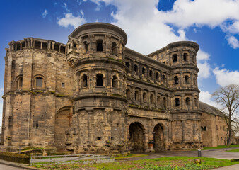 Wall Mural - Trier, Germany the old entry gate Porta Nigra at the border of the center of town