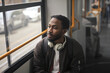 © olly - young man in a tram in the city