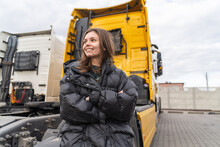 Caucasian Young Woman Driving Truck. Trucker Female Worker, Transport Industry Occupation 