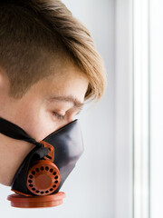 Canvas Print - Young Man in Gas Mask