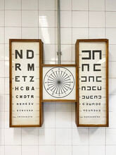 An Antique Eye Chart In An Old Eye Clinic, Vintage Eye Chart With Lettering And Symbols, Optical Examination Equipment, Vertical